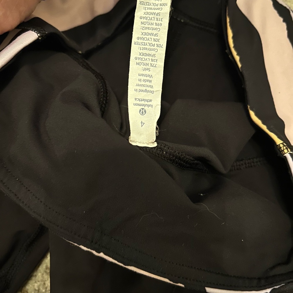 Lulu lemon black leggings with fun minimal design on band and bottom - Picture 4 of 4
